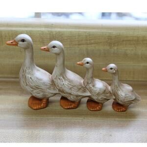 Finally Have Your Ducks In A Row With This Family Of Ducks Figurine.